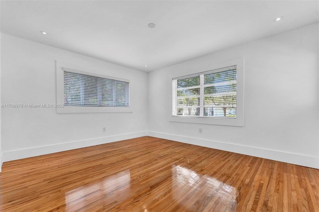 1431 Ancona Ave, Coral Gables, FL 33146 - unfurnished room featuring baseboards, light wood-type flooring, and recessed lighting