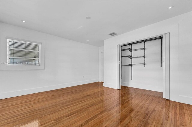 1431 Ancona Ave, Coral Gables, FL 33146 - spare room featuring light wood-style flooring, baseboards, and recessed lighting
