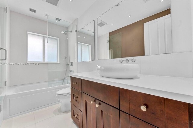 1431 Ancona Ave, Coral Gables, FL 33146 - full bath with vanity, toilet, shower / bath combination, and tile patterned floors