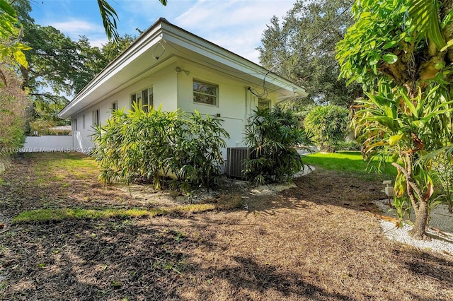 view of home's exterior featuring cooling unit