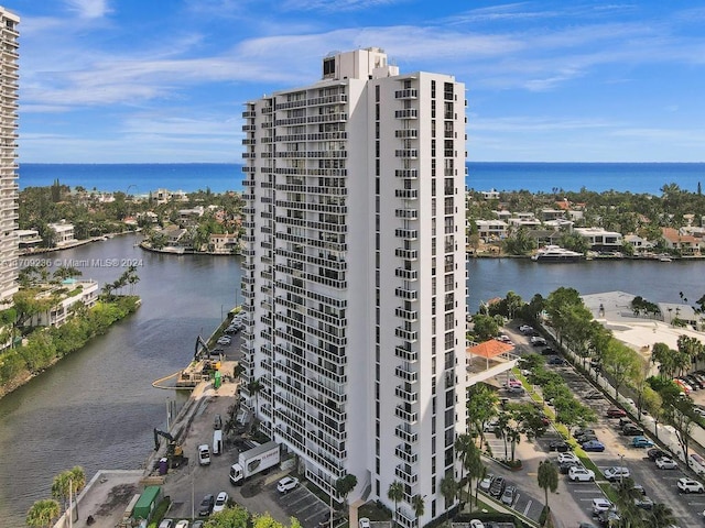 view of property with a water view