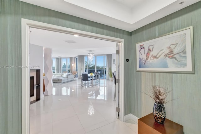 hall with light tile patterned flooring