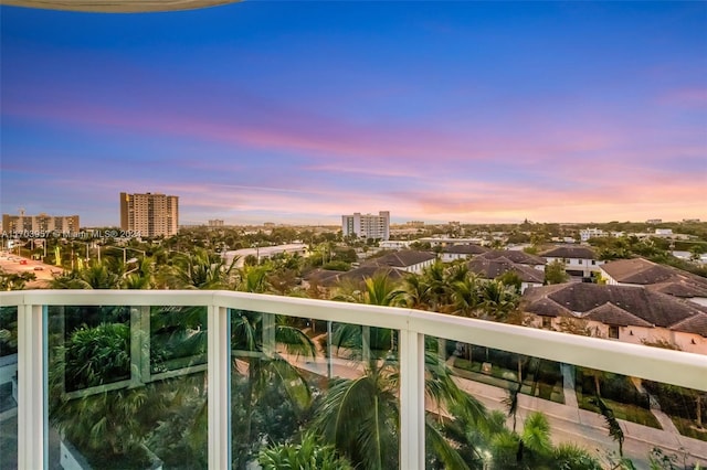 view of balcony at dusk