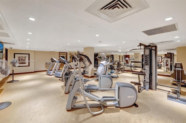 gym with light colored carpet