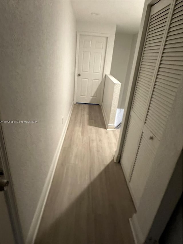 hall featuring light hardwood / wood-style flooring