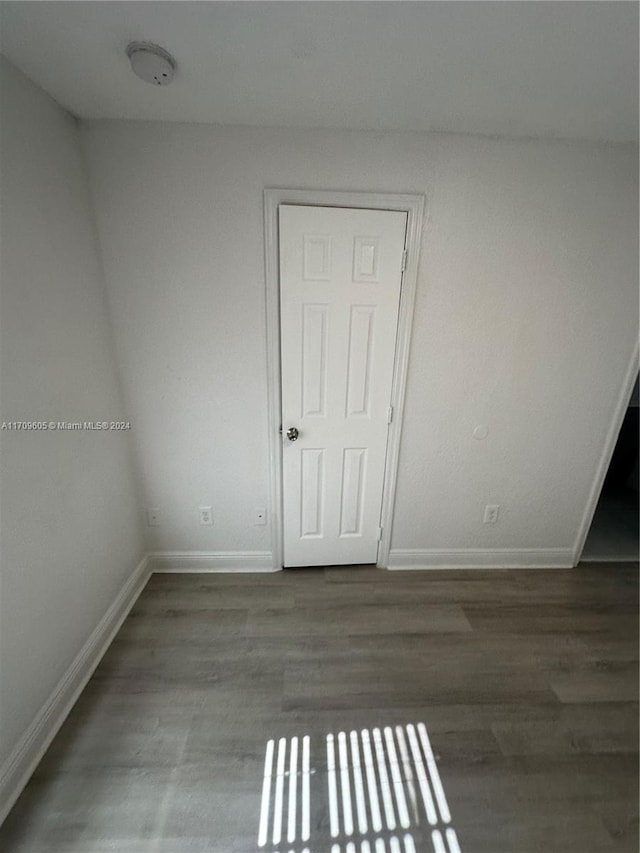 empty room featuring hardwood / wood-style floors