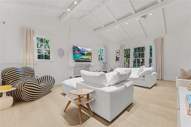 living room featuring wooden ceiling, beamed ceiling, light hardwood / wood-style floors, and high vaulted ceiling