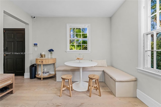 interior space with light hardwood / wood-style flooring and breakfast area