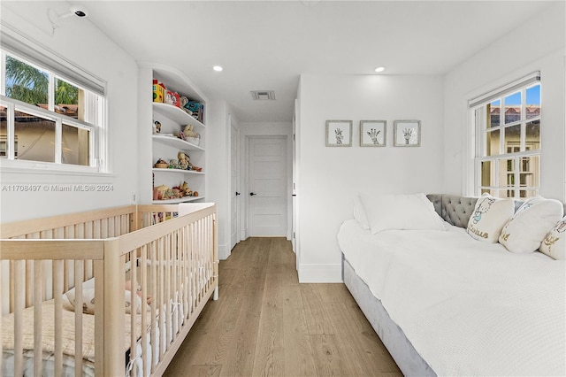 bedroom featuring light hardwood / wood-style flooring