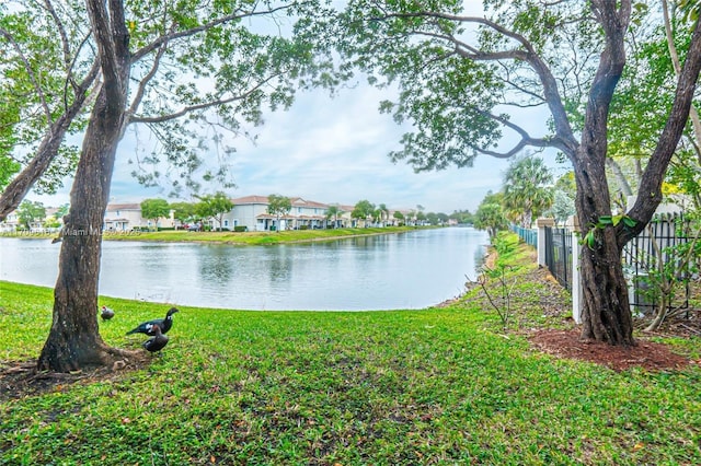 water view featuring fence