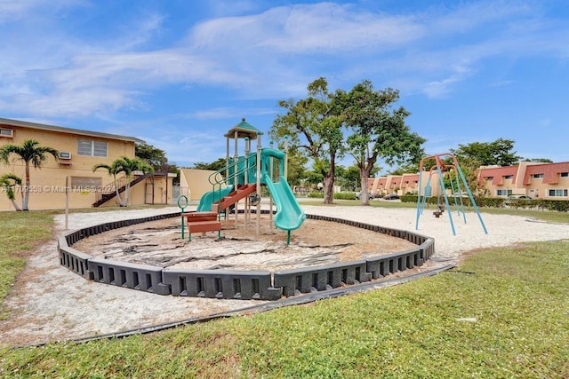 view of jungle gym with a lawn