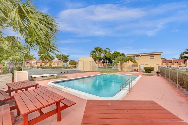 view of pool with a patio area