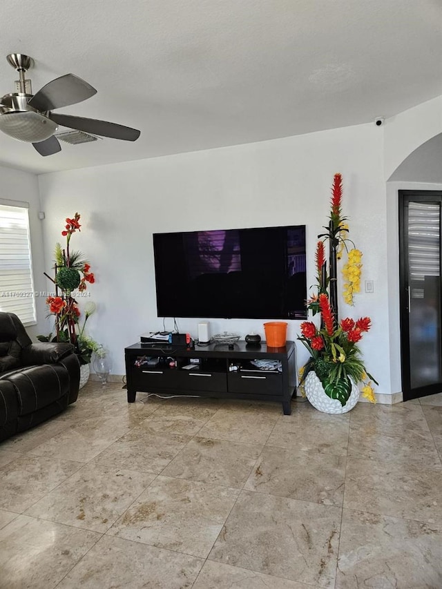 living room featuring ceiling fan