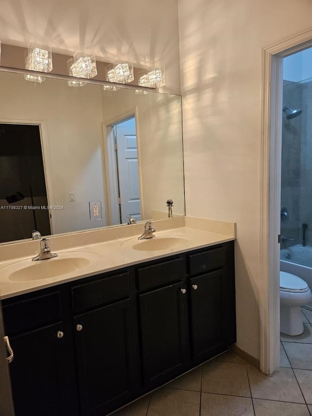 full bathroom featuring tile patterned flooring, shower / bathing tub combination, vanity, and toilet