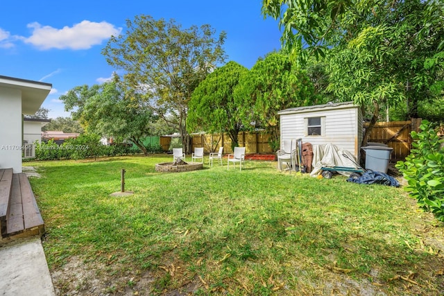 view of yard with a storage unit