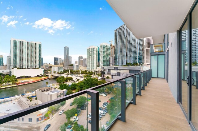 balcony featuring a water view