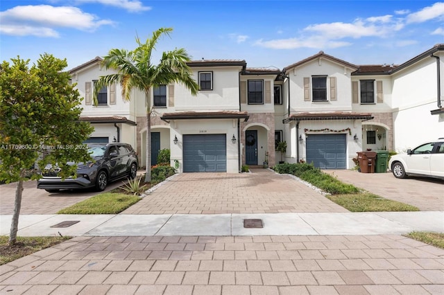 view of front of home with a garage