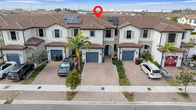 view of property with solar panels