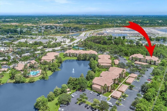 3659 NW Adriatic Ln Unit 305, Jensen Beach, FL 34957 - aerial view of property and surrounding area featuring a large body of water