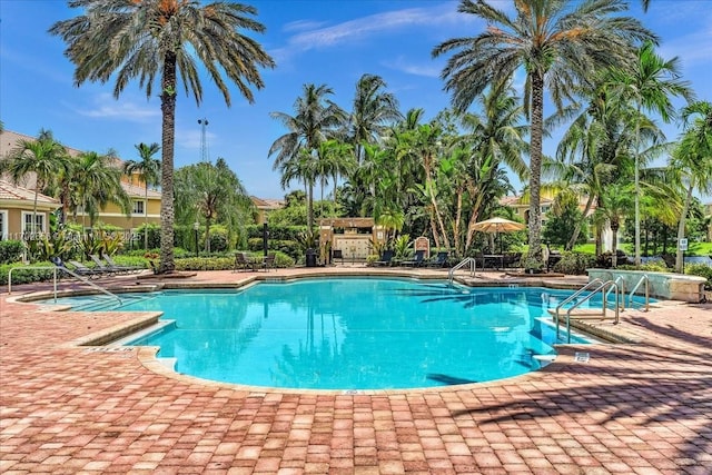 view of pool featuring a patio area