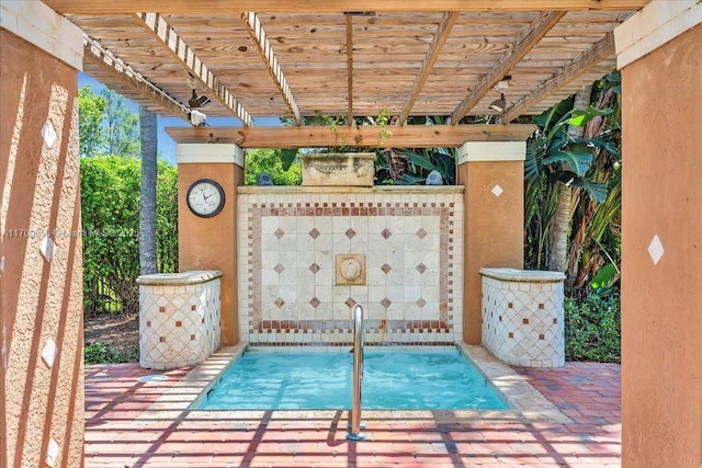 view of swimming pool with a patio area