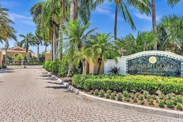 3659 NW Adriatic Ln Unit 305, Jensen Beach, FL 34957 - community / neighborhood sign featuring a gate