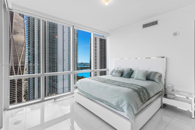 bedroom featuring tile patterned floors