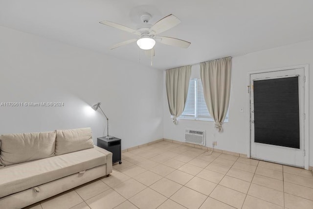 tiled living room with ceiling fan and a wall unit AC