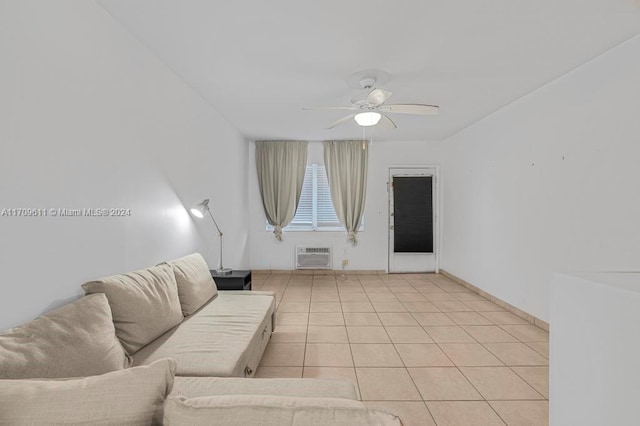 tiled living room with a wall mounted air conditioner and ceiling fan