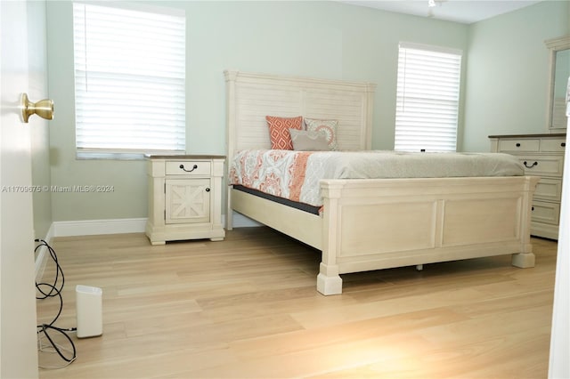 bedroom featuring light wood-type flooring