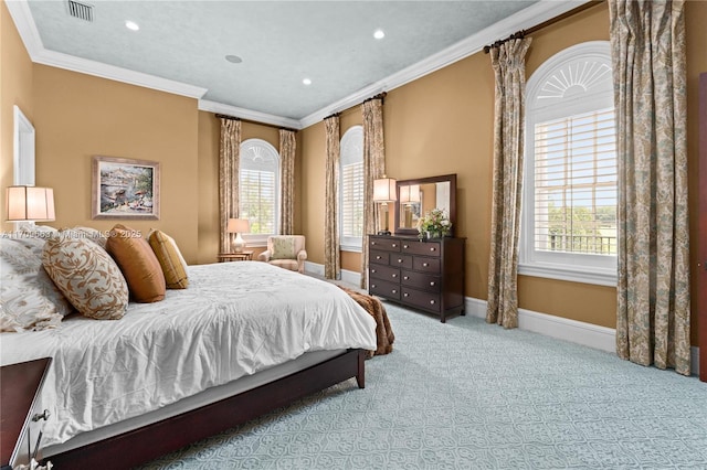 carpeted bedroom with crown molding