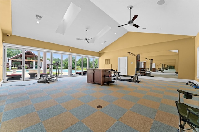 workout area with carpet, a wealth of natural light, high vaulted ceiling, and ceiling fan