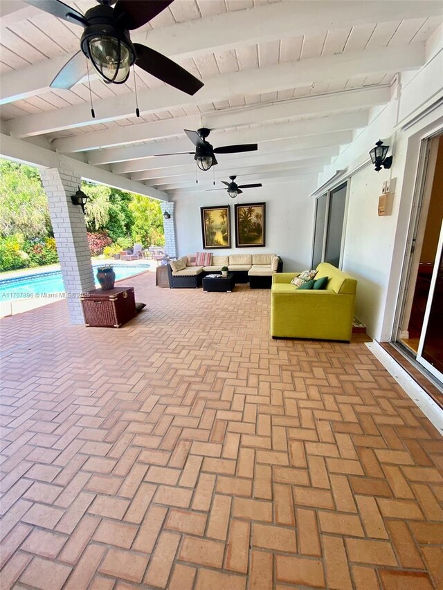 7521 SW 165th Ter, Palmetto Bay, FL 33157 - view of patio / terrace with outdoor lounge area, a ceiling fan, and an outdoor pool