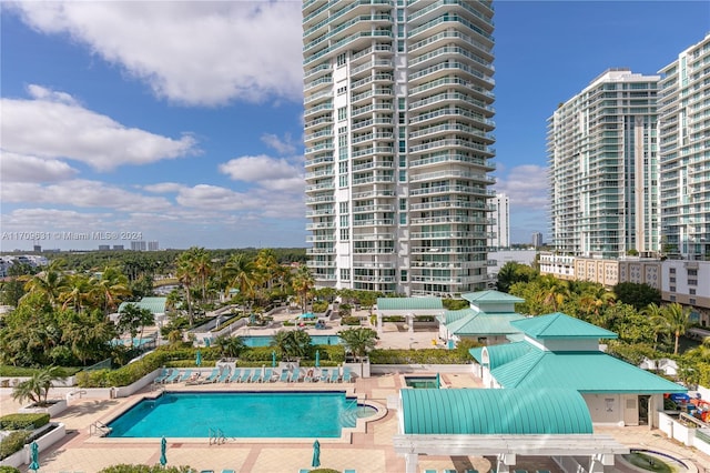 view of swimming pool featuring a patio area