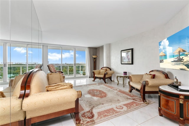 tiled living room featuring a wealth of natural light and a wall of windows