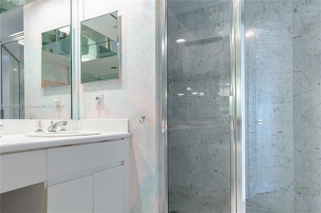 bathroom with vanity and walk in shower