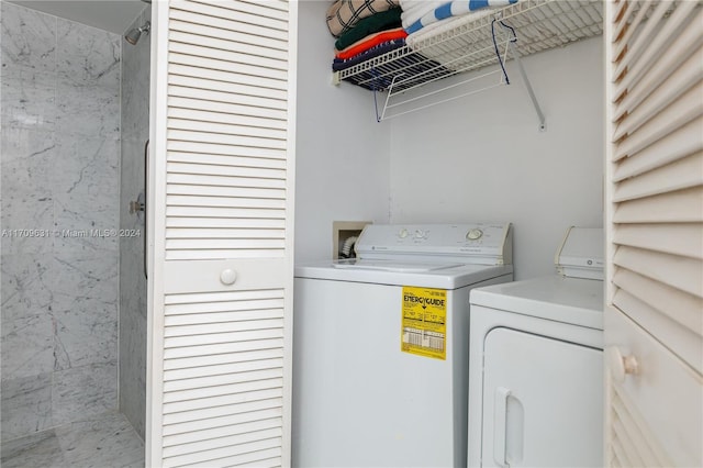 laundry area featuring separate washer and dryer