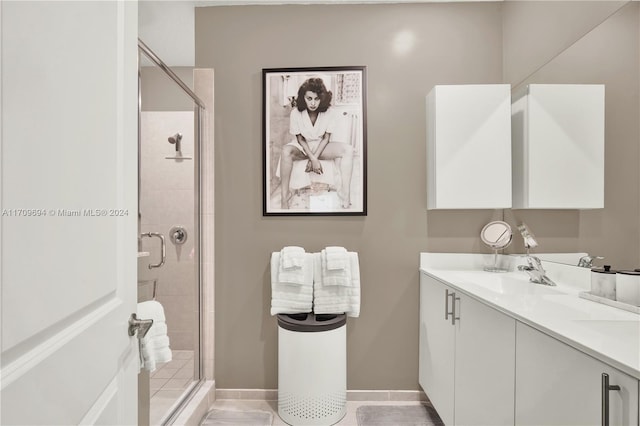 bathroom with vanity and walk in shower