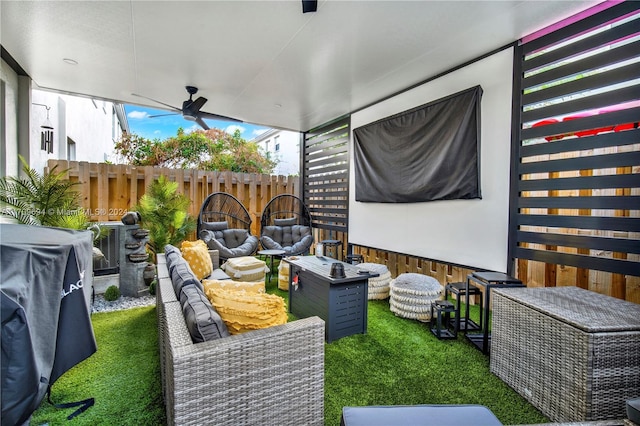 view of patio / terrace featuring an outdoor living space, ceiling fan, and a grill