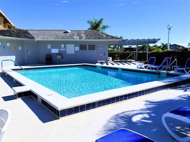 view of swimming pool with a patio