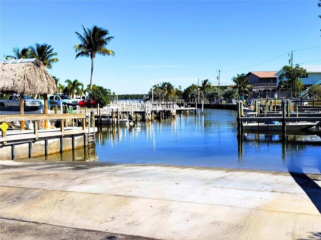 dock area featuring a water view