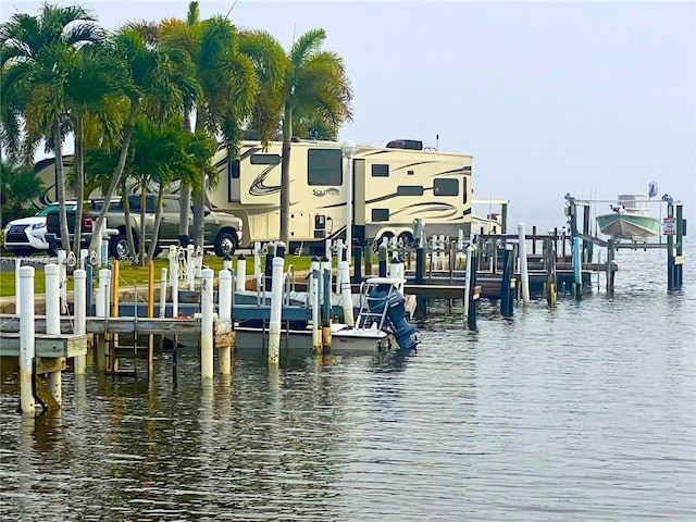 view of dock with a water view