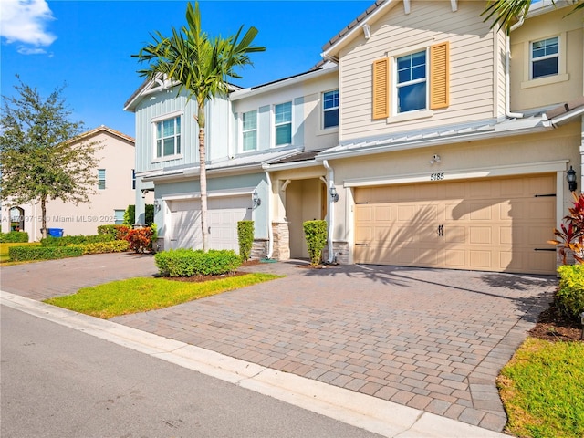 view of front of property with a garage