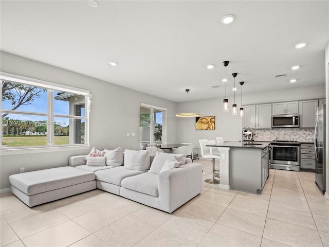 living room featuring light tile patterned floors