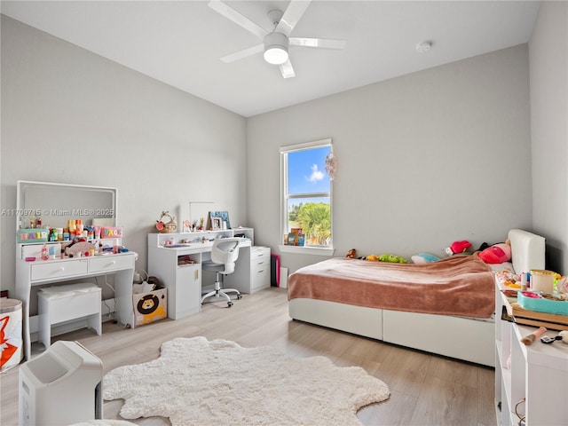 bedroom featuring light hardwood / wood-style flooring and ceiling fan