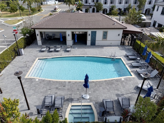 view of swimming pool featuring a patio