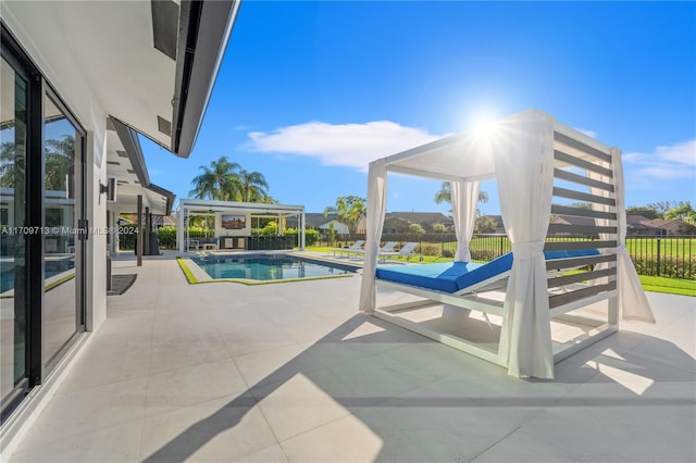 view of pool featuring a patio