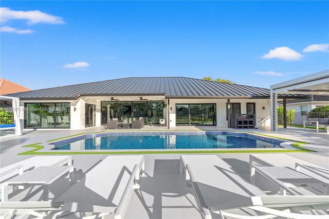 view of pool featuring an outdoor living space, ceiling fan, and a patio