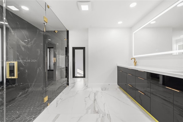 bathroom with vanity and walk in shower