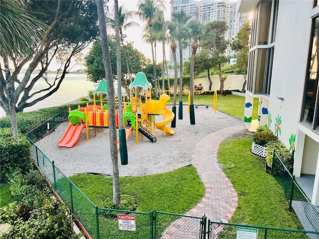 view of play area featuring a lawn